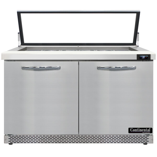 A stainless steel Continental Refrigerator with two glass doors.