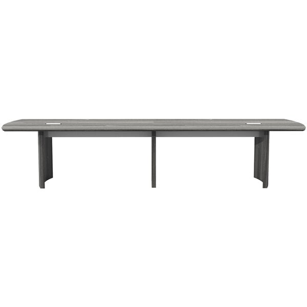 A Safco Medina rectangular conference table in steel gray with legs.