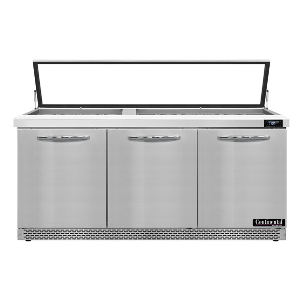 A Continental Refrigerator stainless steel refrigerated sandwich prep table with three doors.