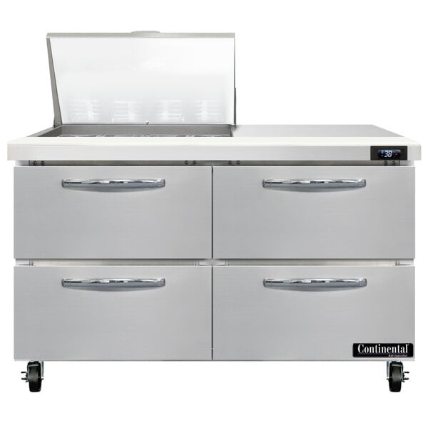 A stainless steel Continental Refrigerator with 4 drawers.