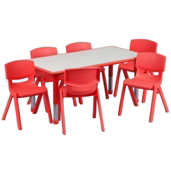 A red plastic Flash Furniture rectangular table with six red chairs.