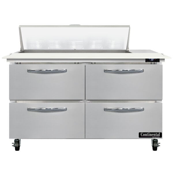A stainless steel Continental Refrigerator with 4 drawers.