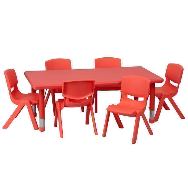 A red plastic Flash Furniture rectangular table and chairs.
