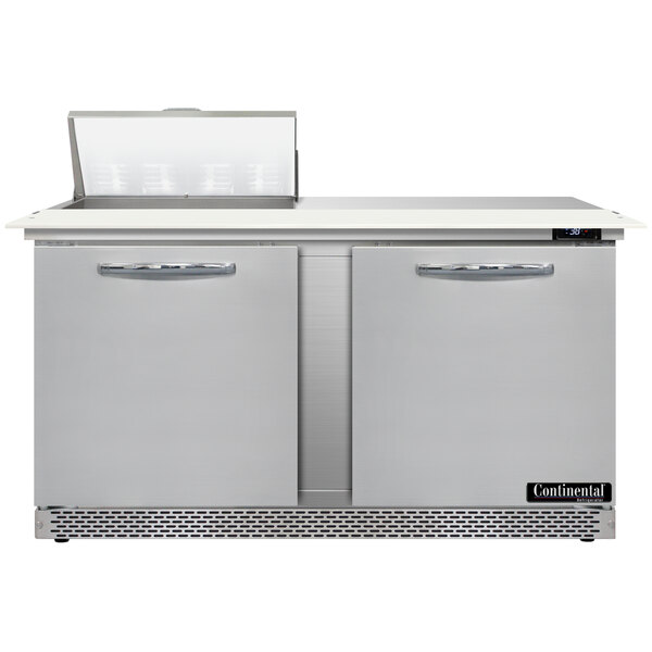 A stainless steel Continental Refrigerator with two doors and a cutting top.