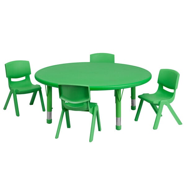 A green plastic table with a green plastic chairs.