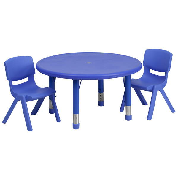 A blue plastic round table with two blue chairs.