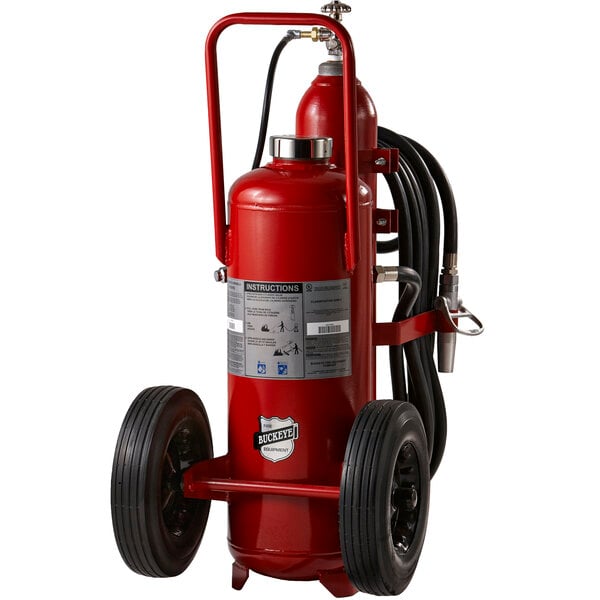 A purple Buckeye fire extinguisher on rubber wheels.
