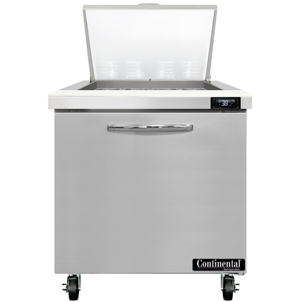 A stainless steel Continental Refrigerator with a glass door.