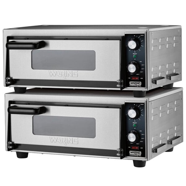 A silver Waring countertop pizza oven stacking kit on a counter with two ovens stacked on top of each other.