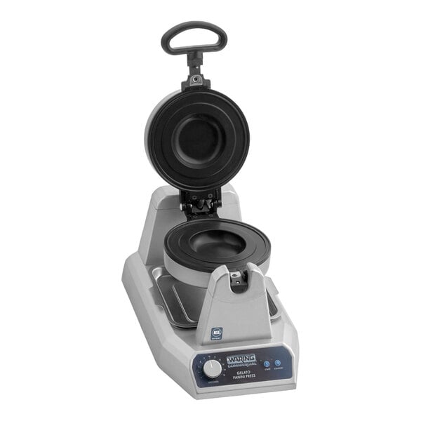 A commercial gelato and ice cream panini press with a round heating plate and control knob.