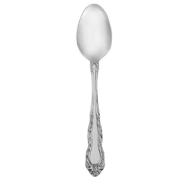 A Walco Patrician stainless steel teaspoon with a white background.