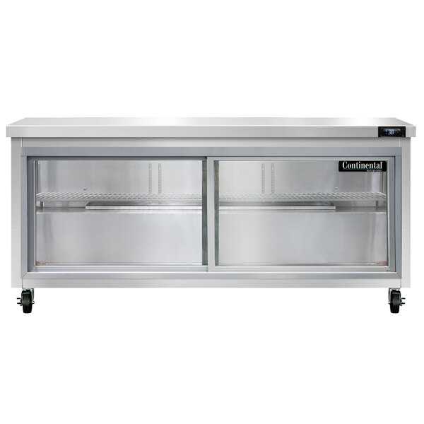 A stainless steel Continental undercounter refrigerator with sliding glass doors.