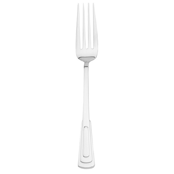 A silver Walco Chanteclair table fork with a white handle.