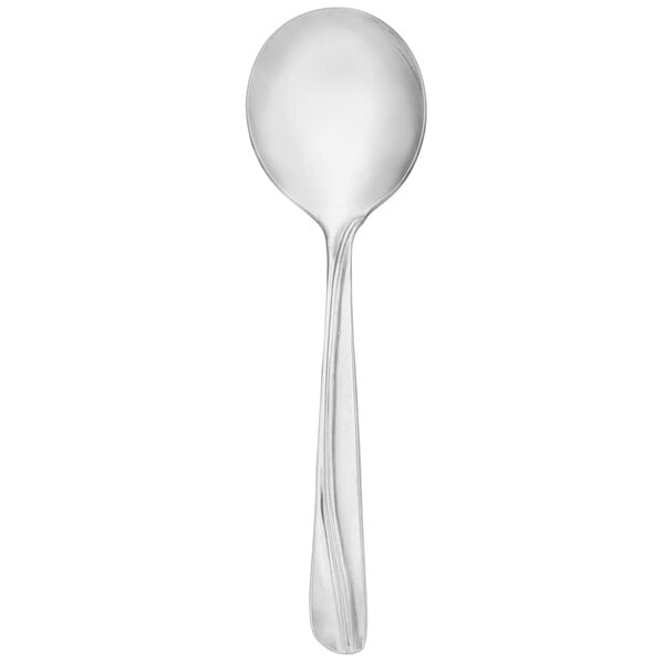 A Walco stainless steel bouillon spoon with a scroll pattern on the handle.