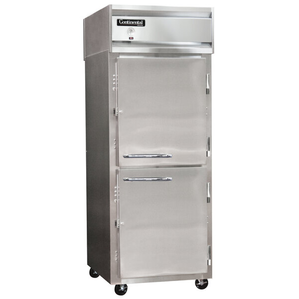 A large stainless steel Continental Refrigerator with a white metal half door.
