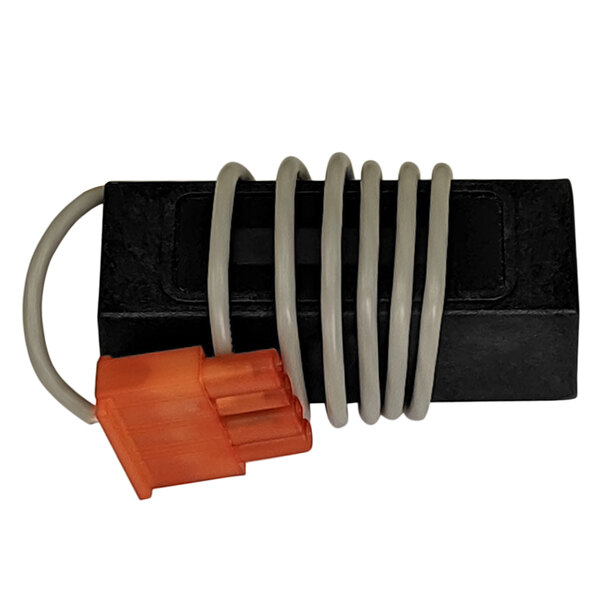 A black box with an orange and black electrical cord attached.