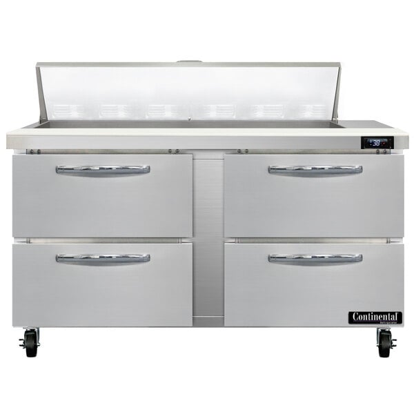 A stainless steel Continental Refrigerator with 4 drawers.
