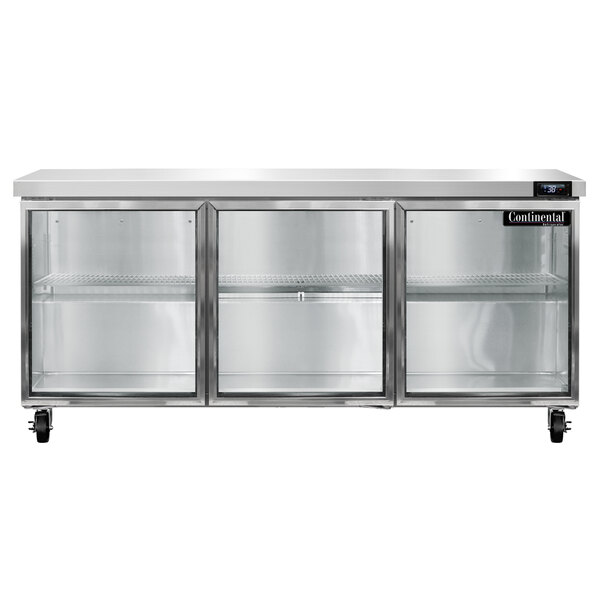 A stainless steel Continental Refrigerator with three glass doors.