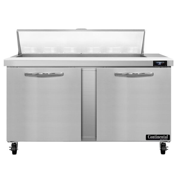 A stainless steel Continental Refrigerator with two doors and drawers.