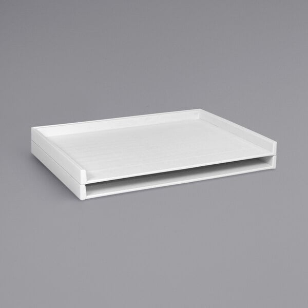 A white rectangular Safco stack tray with a black handle.