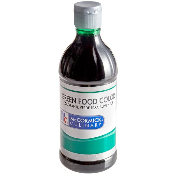 A bottle of McCormick green food color with a white label.