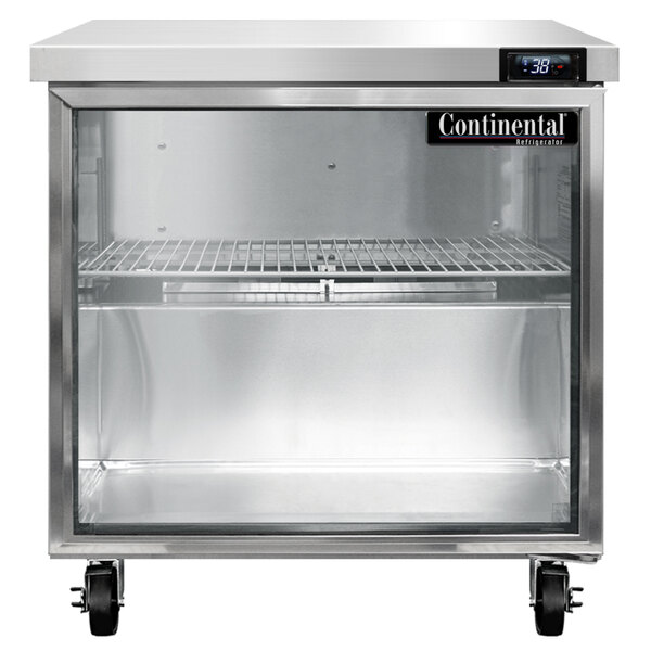 A Continental Refrigerator undercounter refrigerator with a glass door on a counter.