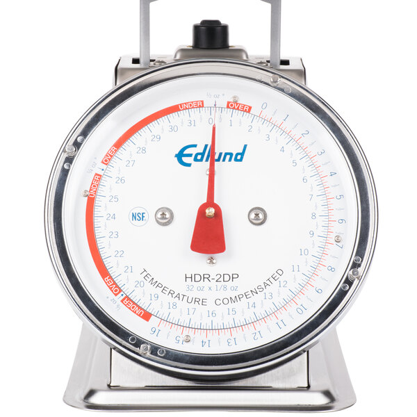 A close up of the Edlund stainless steel portion scale platform.