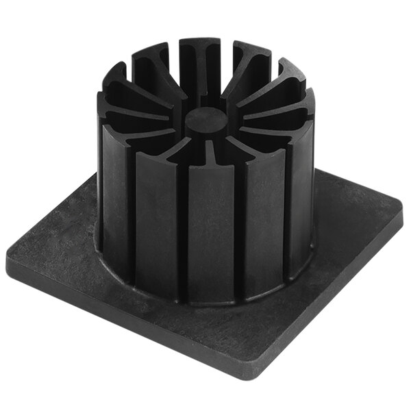 A black plastic square with a circular design in the center.