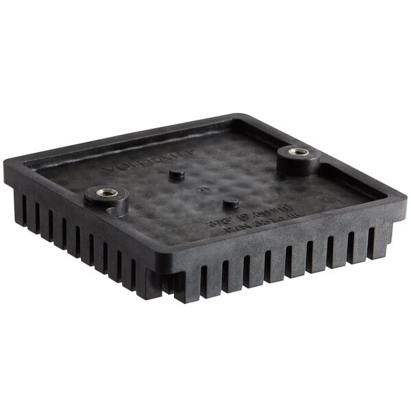 A black square plastic push block with two holes.