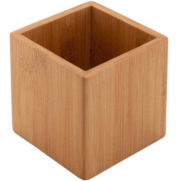 A square wooden storage jar with a lid.