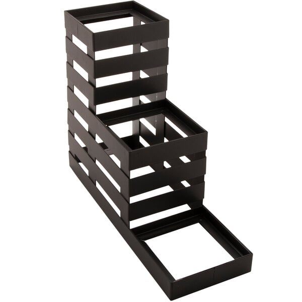a black metal object with holes