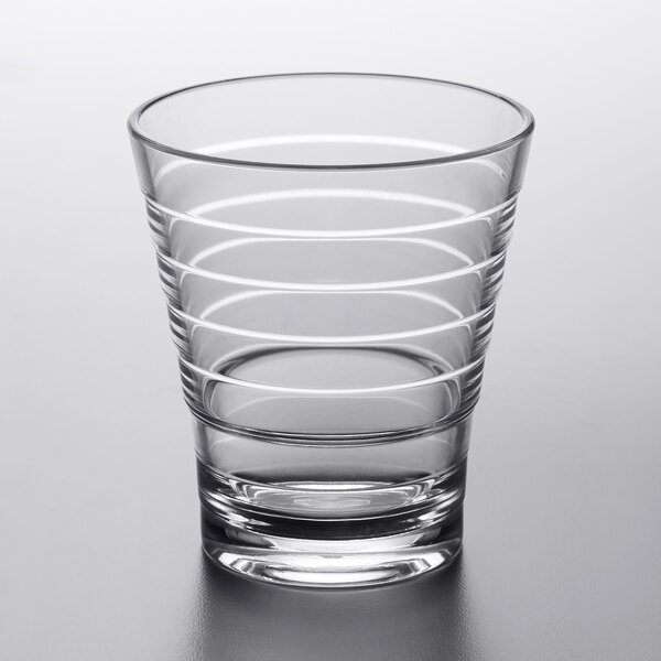 a clear glass with a few lines on it