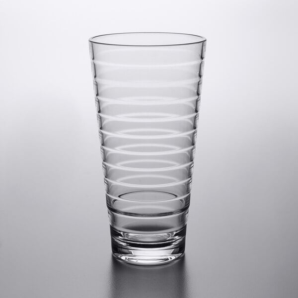 a clear plastic cup with a white background