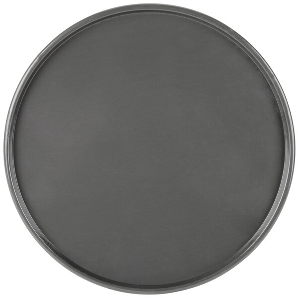 A black round Chicago Metallic pizza pan with a metal rim.