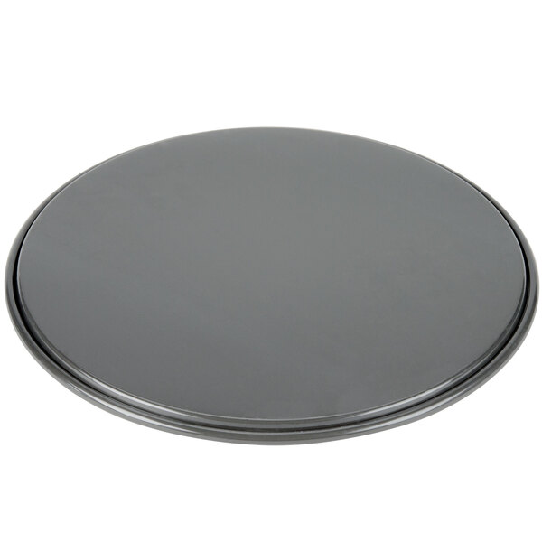A black Chicago Metallic round metal pizza pan.