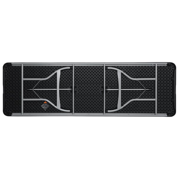 A black Lifetime plastic folding table with a grey metal frame.