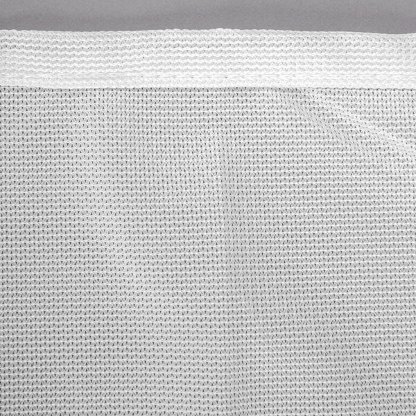 A white uncoated nylon mesh cover with a zippered closure.