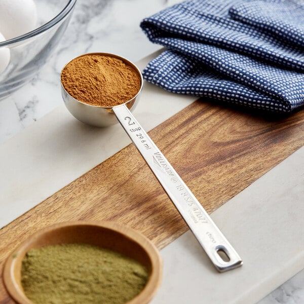 a metal teaspoon with spices