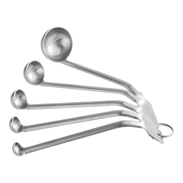 A set of five stainless steel measuring spoons attached by a metal ring.