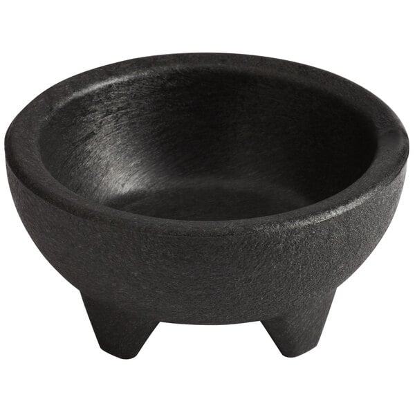 A black Choice Thermal Plastic molcajete bowl with three legs.