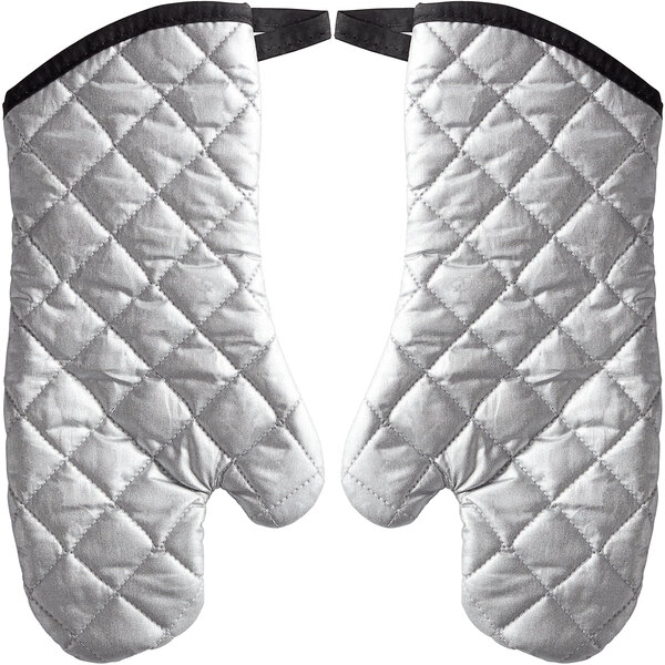 A pair of white oven mitts with black trim and quilted silver silicone.