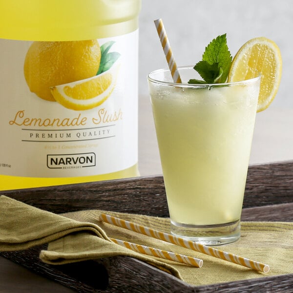 Lemonade slushy topped with a fresh lemon and mint