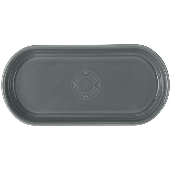 A grey rectangular Fiesta bread tray with a small oval design.