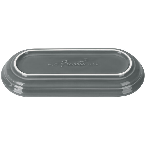 A grey rectangular Fiesta bread tray with a logo.
