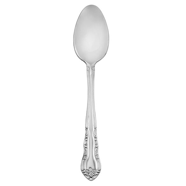 A Walco Discretion stainless steel teaspoon with a handle.