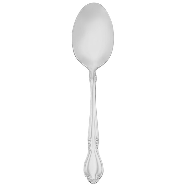 A silver spoon with a white handle.