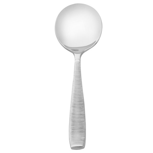 A close-up of a Walco stainless steel bouillon spoon with a silver handle.
