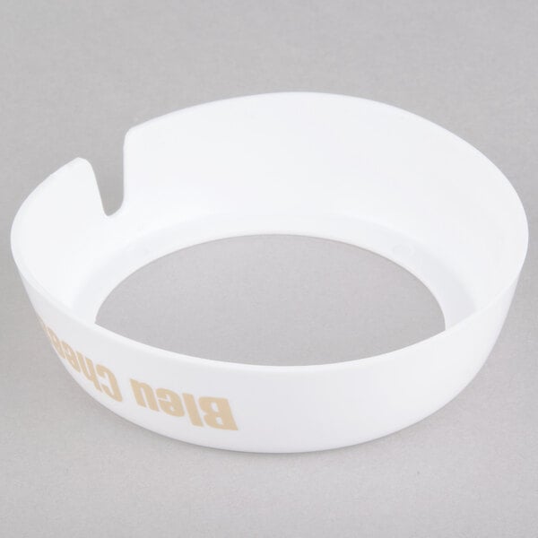 A white plastic Tablecraft collar with beige lettering that reads "Bleu Cheese"