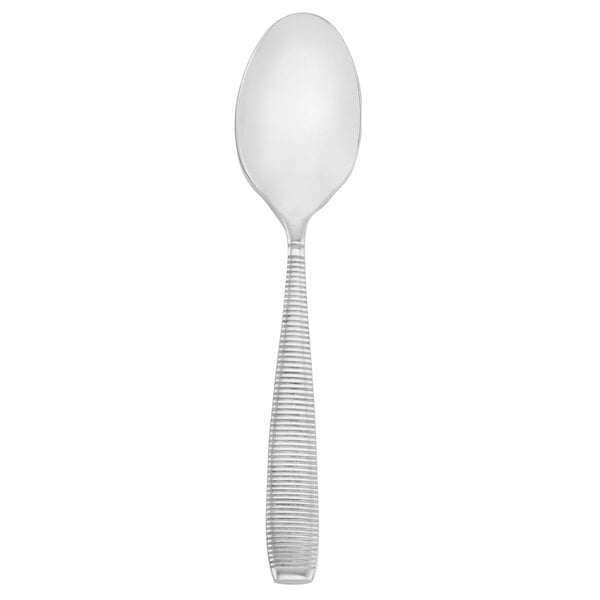 A Walco stainless steel teaspoon with a black handle.