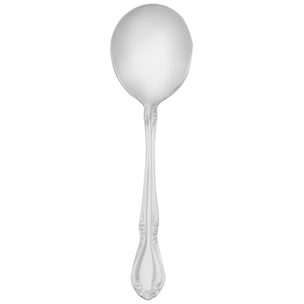 A silver Walco Illustra bouillon spoon with a handle.